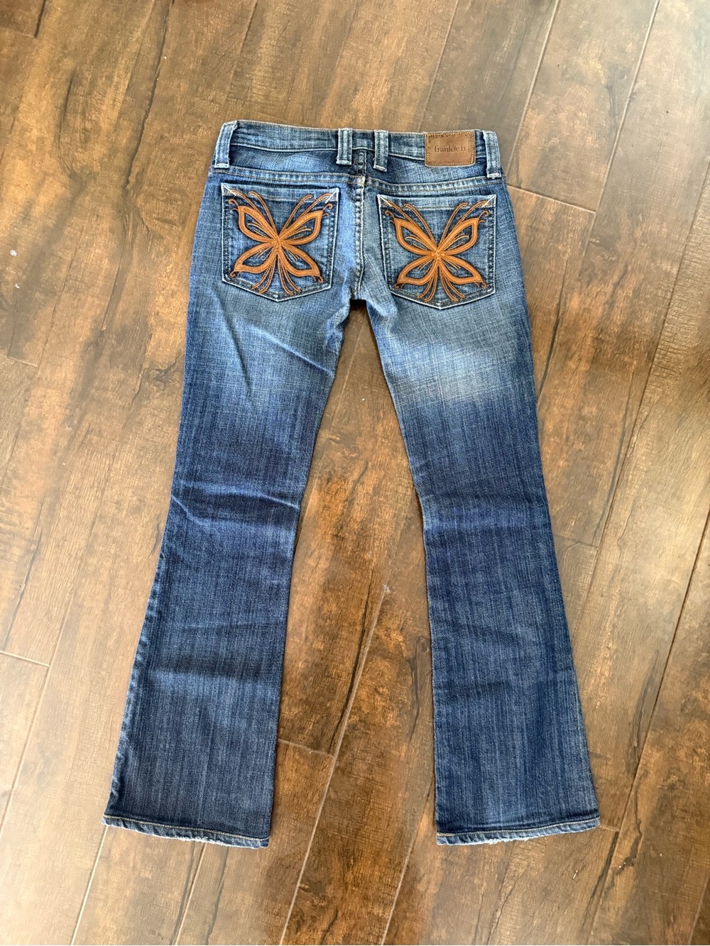 Frankie B. Dark Blue Flare Jeans with Orange Embroidered Pockets